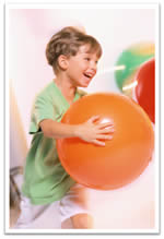 kid running with a ball